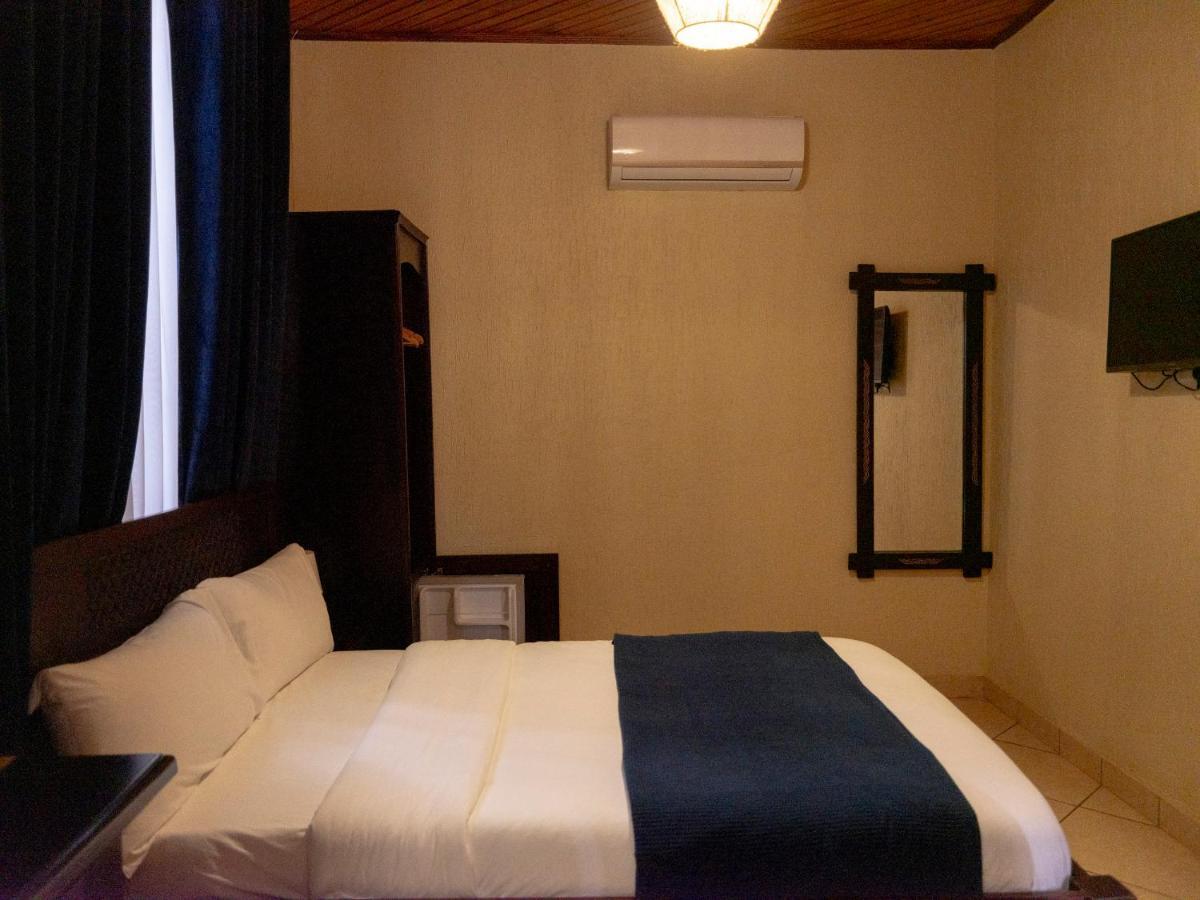 The Haven Boutique Hotel คูมาซี ภายนอก รูปภาพ