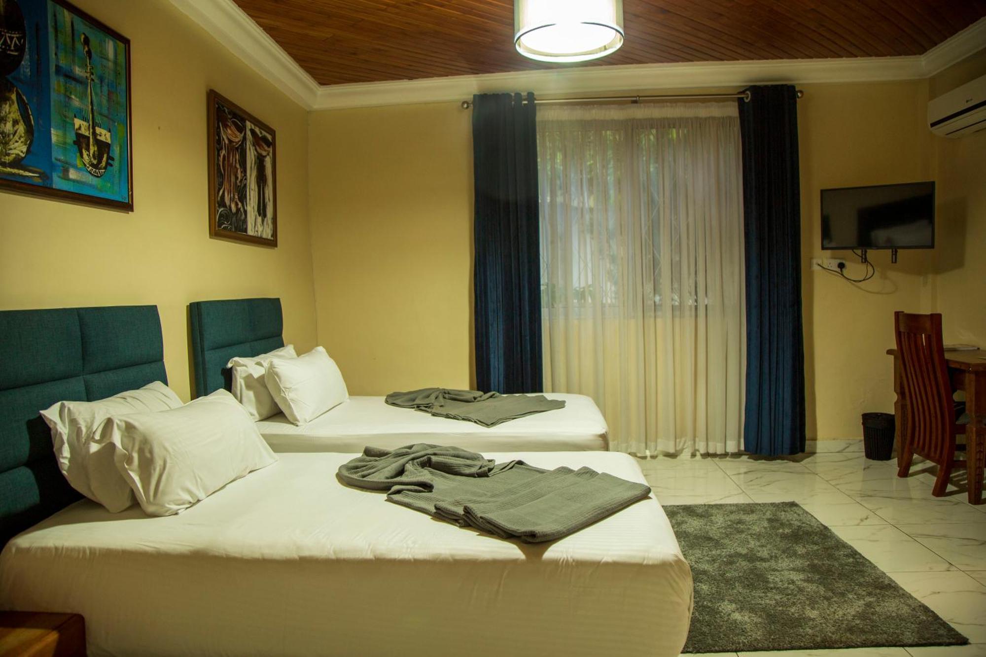 The Haven Boutique Hotel คูมาซี ภายนอก รูปภาพ