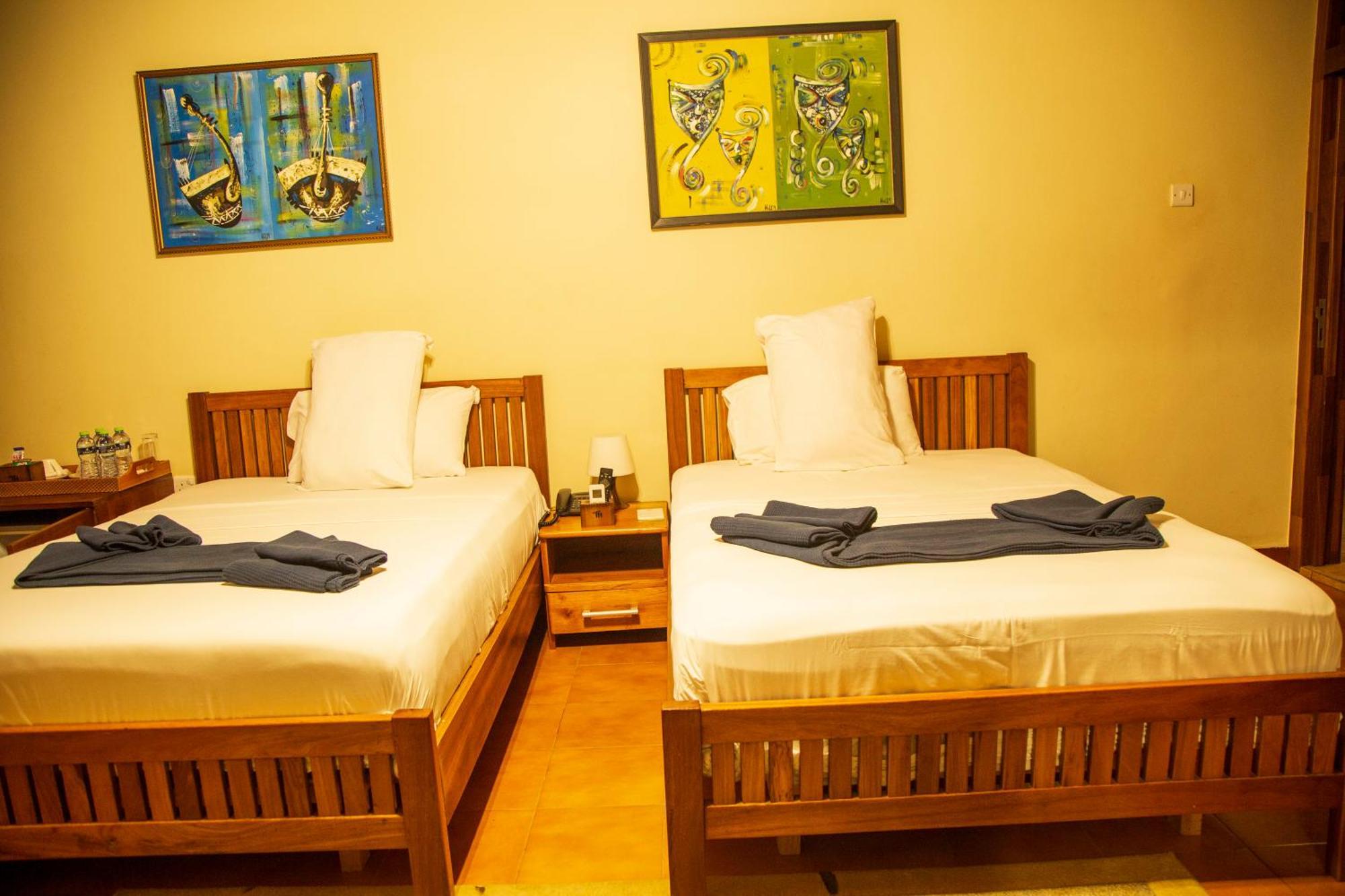 The Haven Boutique Hotel คูมาซี ภายนอก รูปภาพ